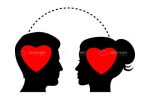 Silhouette of Man and Woman Profiles with Hearts Inside
